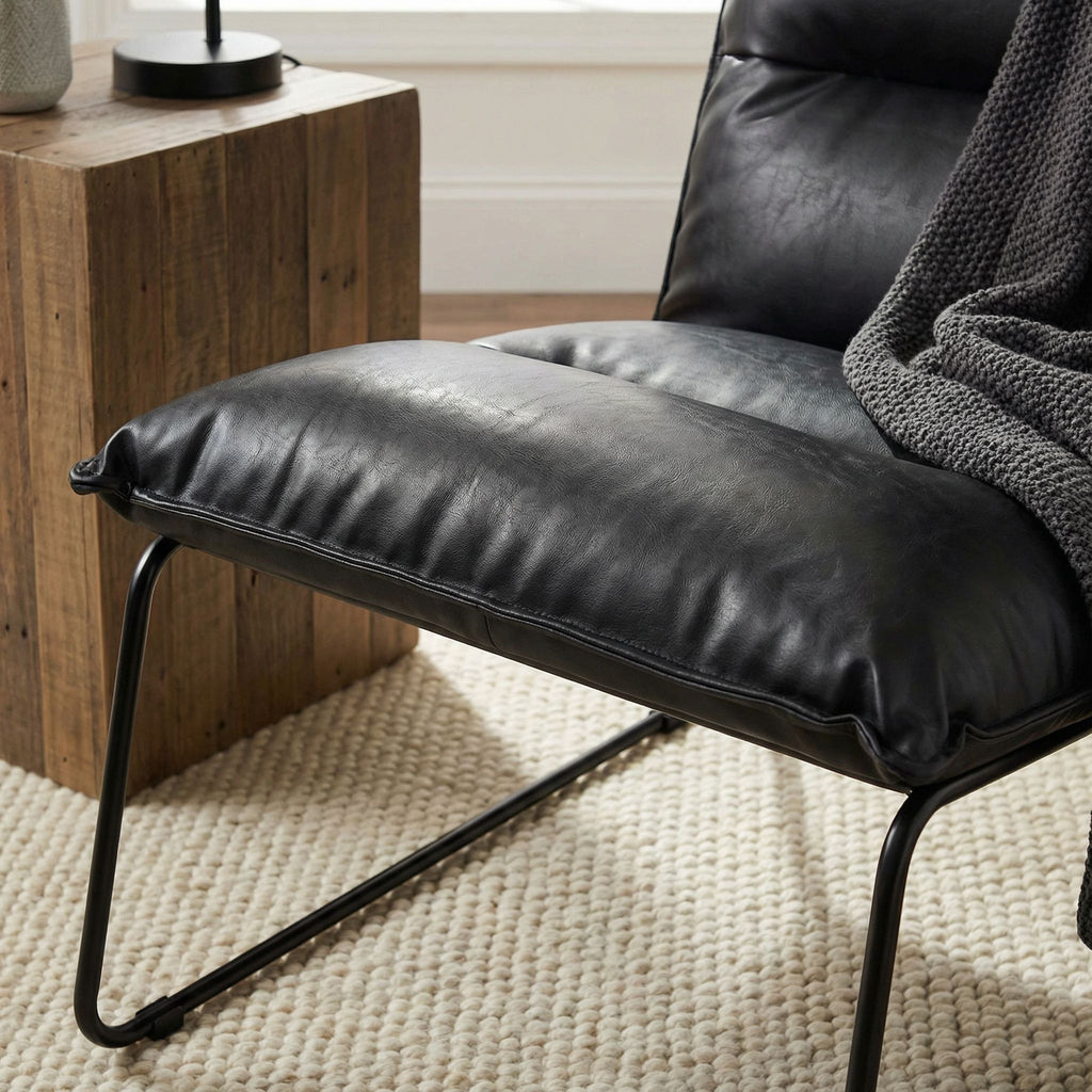 Havana Accent Chair in Distressed Black faux Leather and Metal Legs