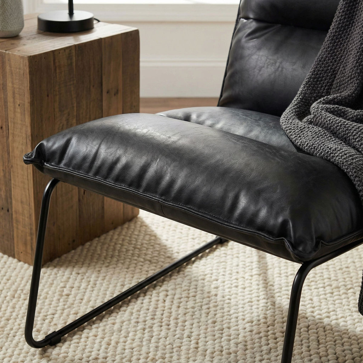 Havana Accent Chair in Distressed Black faux Leather and Metal Legs