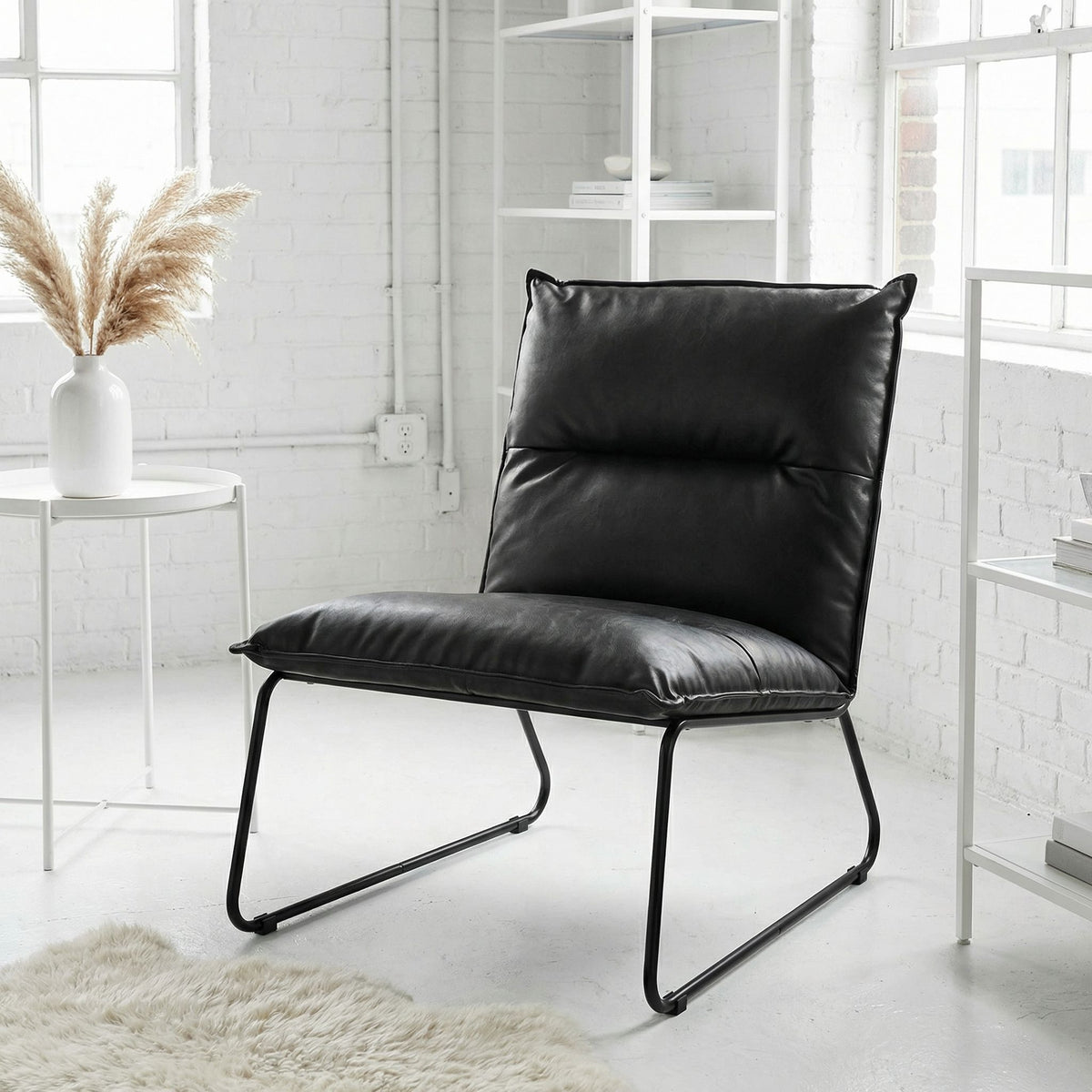 Havana Accent Chair in Distressed Black faux Leather and Metal Legs