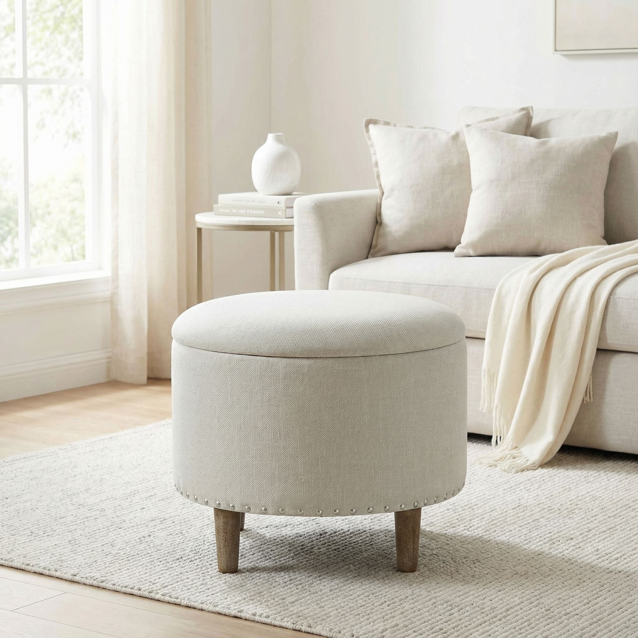 Hosta 19" Round Storage Ottoman in Light Beige Linen
